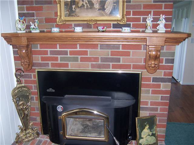 Fireplace mantel - stained oak